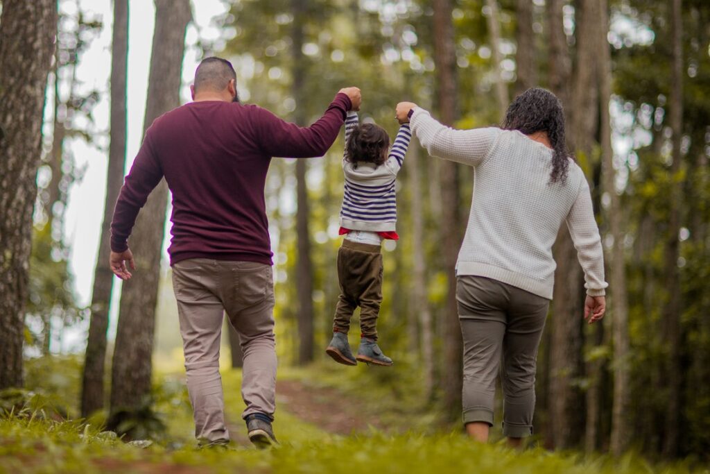 Parents playing with children