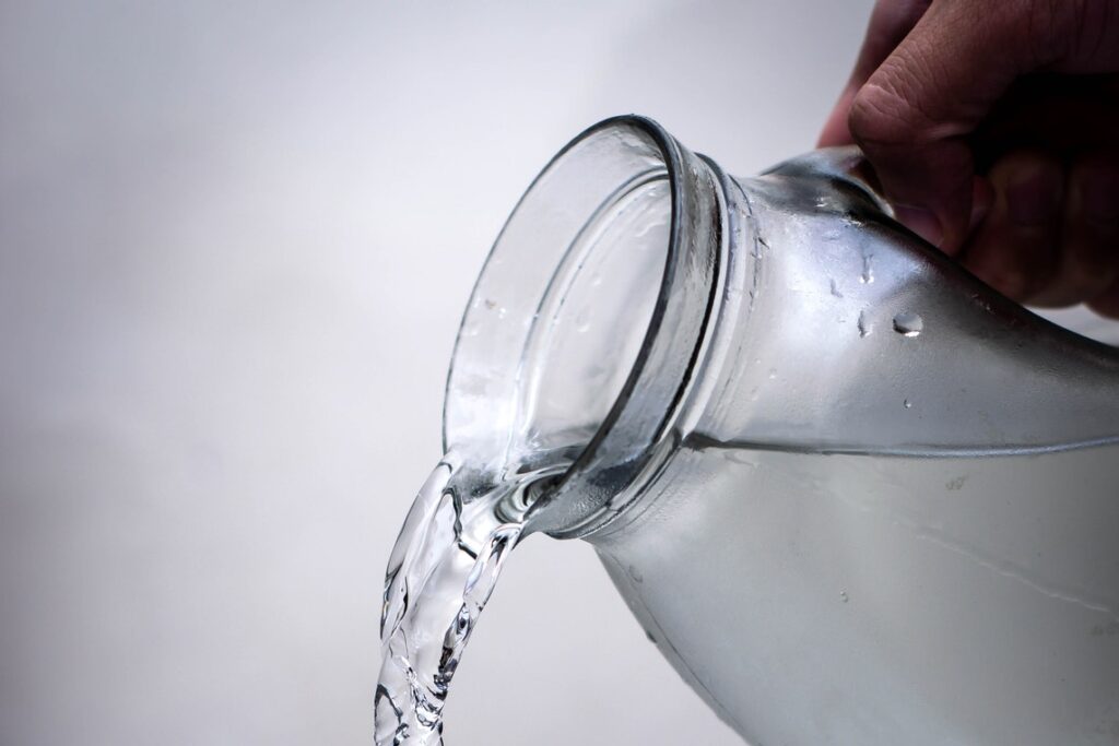 Putting water in glass