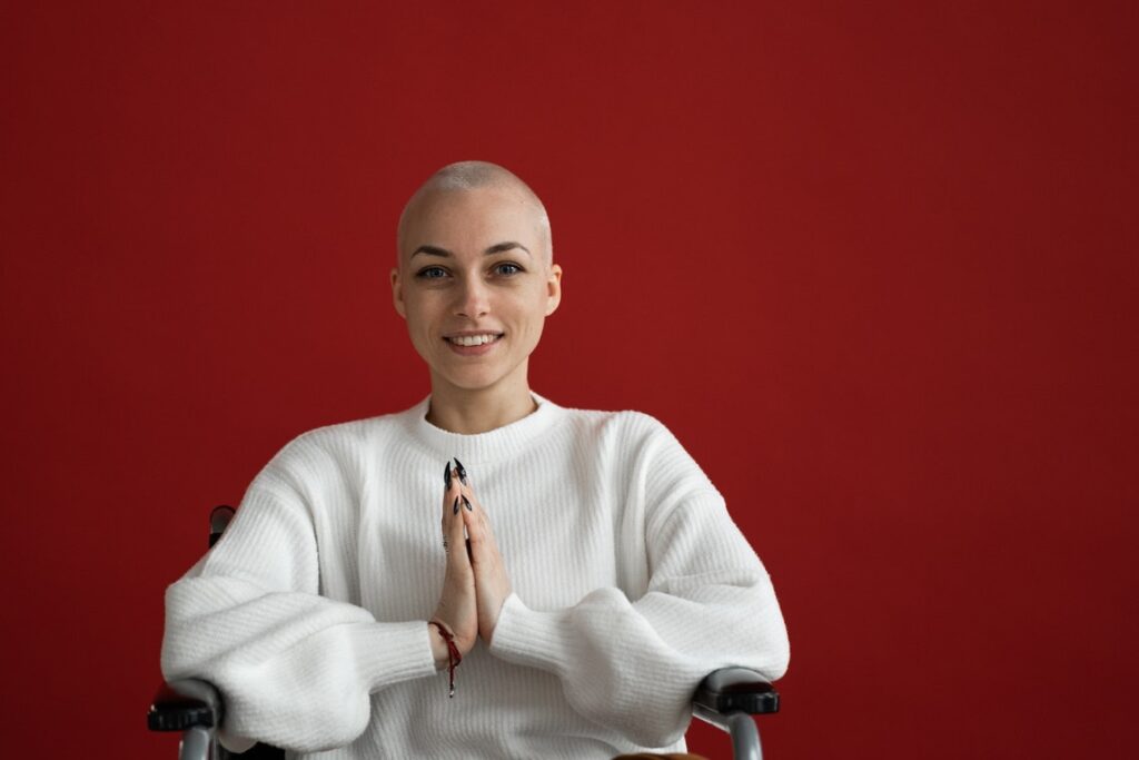 A Girl Sitting In The Chair And Performing Yoga