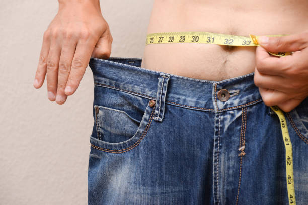 A man losing weight after using flax seeds.