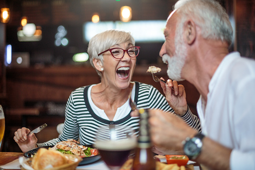 A couple enjoying party.