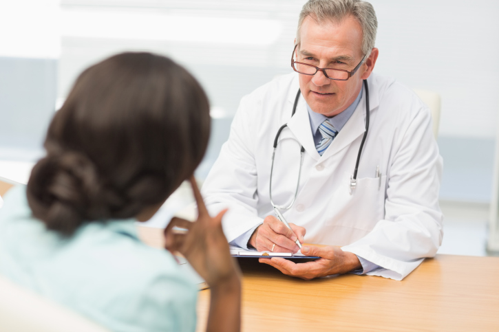 Doctor examining a mentally sick patient.