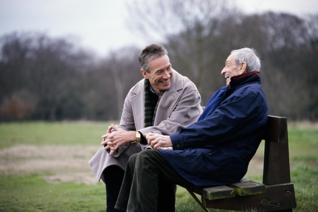 Son and father sharing their experiences.