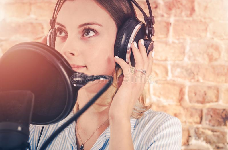 A girl producing her audio book.