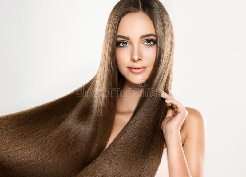 A woman having long hair.