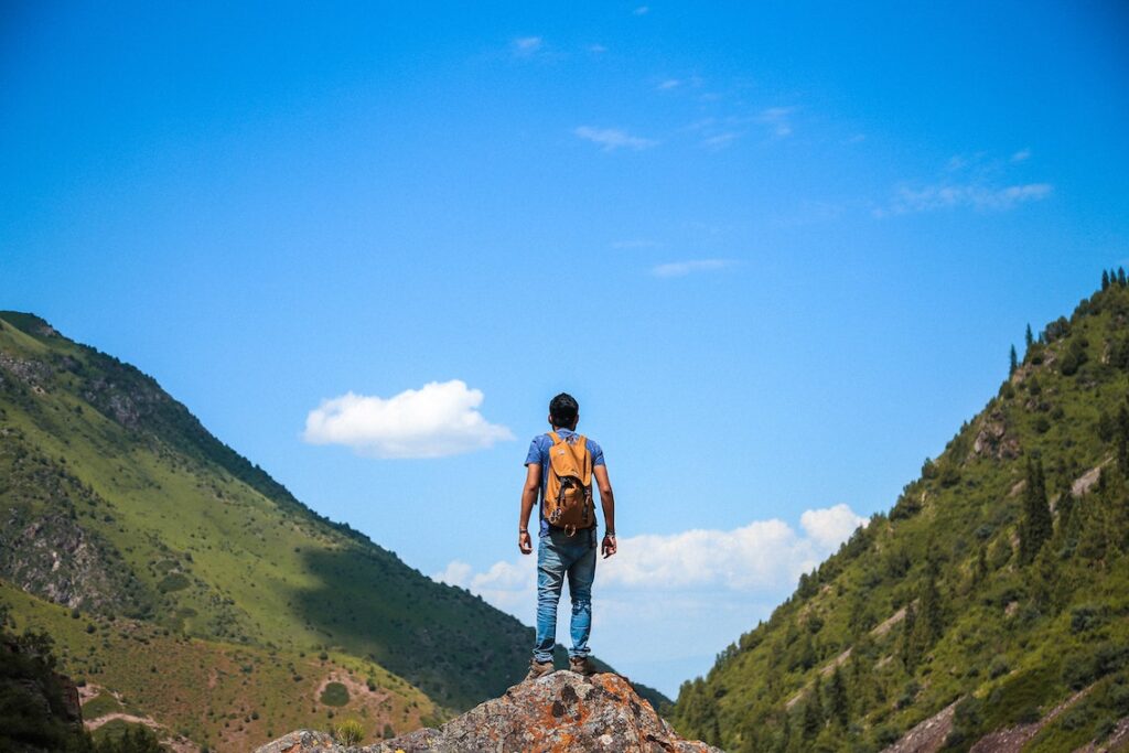 A man on the top of mountain.