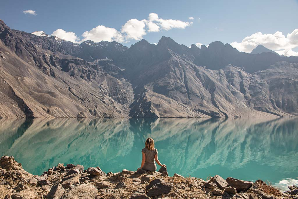 A Girl Sitting In front Of Lake In Tajikistan.