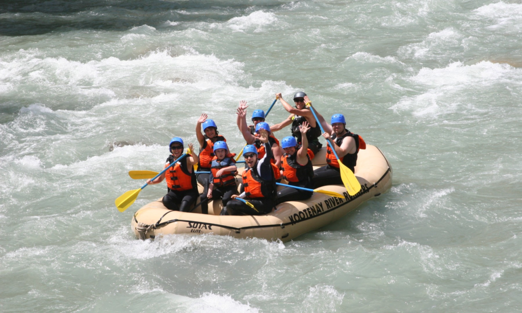 Tourists enjoying river rafting in Kashmir.