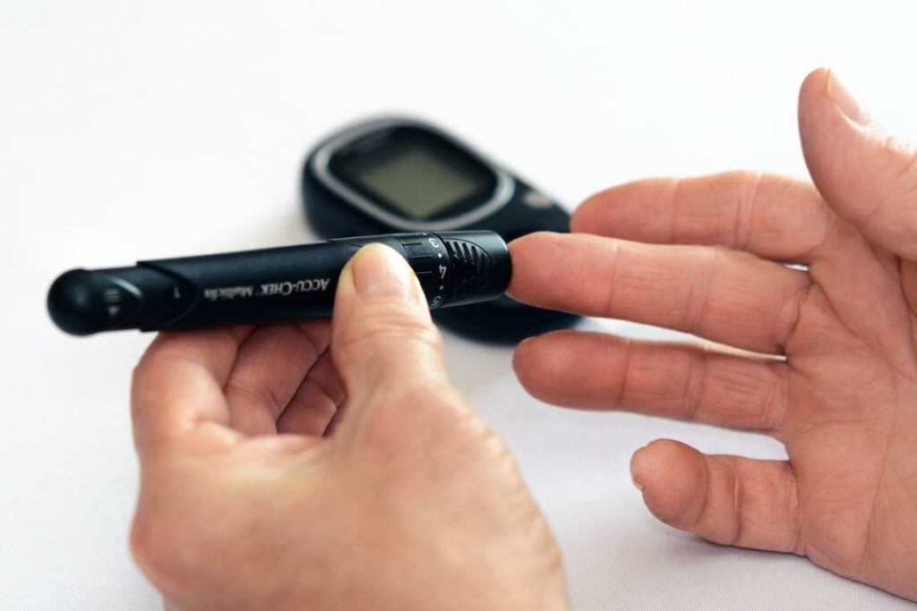 Man testing his blood sugar level.